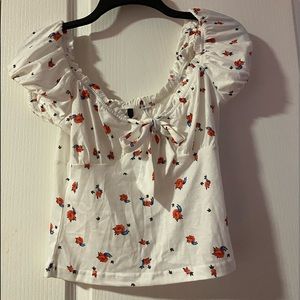 White floral off the shoulder crop top